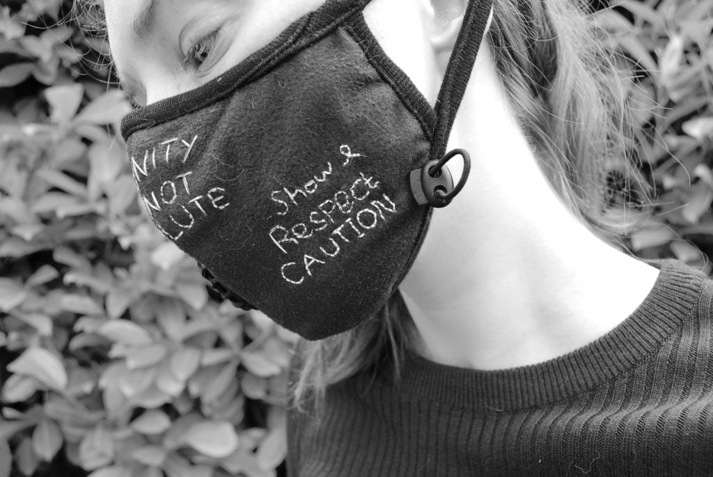 A final back and white photo of the side of the mask while being worn.